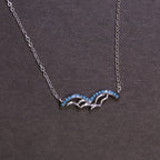 925 Sterling Silver Bat Wing Charm with Turquoise CZ